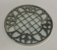 A good silver teapot stand attractively decorated