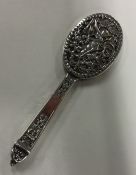 A Miniature silver handbag mirror decorated with a