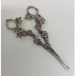 A pair of Continental silver grape scissors emboss