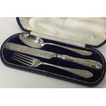 A cased silver three piece christening set. Sheffi