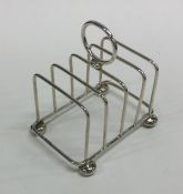 An Edwardian silver toast rack. Sheffield 1918. By