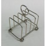 An Edwardian silver toast rack. Sheffield 1918. By