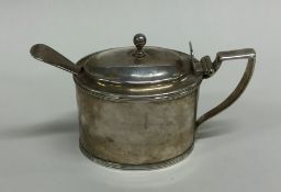 A good Georgian silver mustard pot together with m