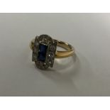 An Art Deco sapphire and diamond cluster ring in t