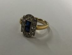 An Art Deco sapphire and diamond cluster ring in t