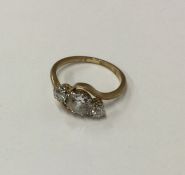 A good large diamond crossover ring in 18 carat go