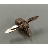 An unusual miniature pendant in the form of a bee