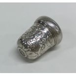 A chased 18th Century silver nutmeg grater with sc