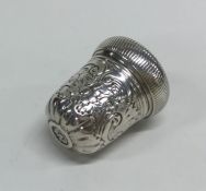 A chased 18th Century silver nutmeg grater with sc