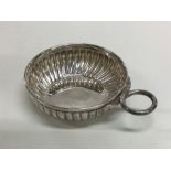A Continental silver bleeding bowl of half fluted