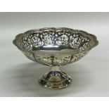 An Edwardian silver bonbon dish. Birmingham 1957.