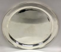 GUILD OF HANDICRAFTS: A large circular silver tray