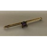 An amethyst and demantoid garnet brooch. Approx. 3