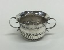 An early 18th Century miniature silver porringer o