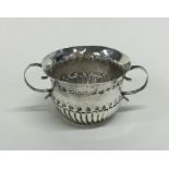 An early 18th Century miniature silver porringer o