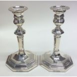 A pair of tall silver candlesticks. Sheffield. By