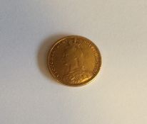 An 1889 full sovereign. Est. £250 - £350.