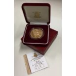 A Queen Elizabeth II Jersey proof £5 gold coin. Es