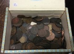 A tub containing copper and other coins. Est. £10