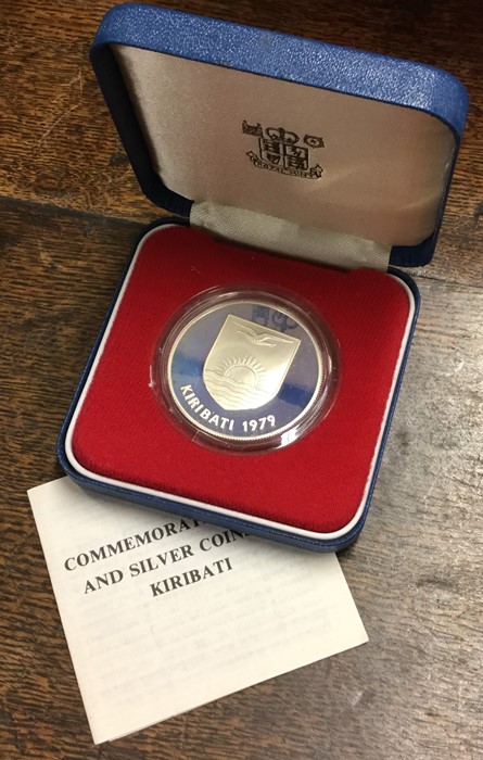 A cased proof silver Kiribati 1979 coin. Est. £15