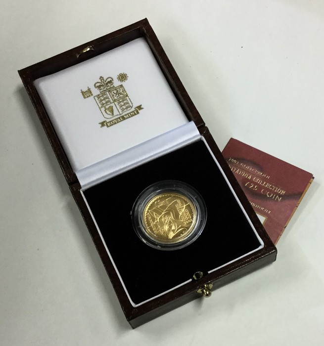 A Royal Mint Britannia £25 1/4 ounce gold coin. Es