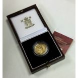 A Royal Mint Britannia £25 1/4 ounce gold coin. Es