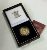 A Royal Mint Britannia £25 1/4 ounce gold coin. Es