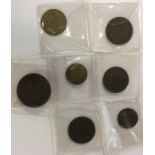 A group of Irish tokens. Est. £20 - £30.