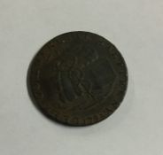 A 'Commercial Halfpenny 1793' token. Est. £15 - £2