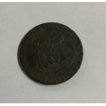 A 'Commercial Halfpenny 1793' token. Est. £15 - £2