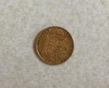 An 1887 half sovereign. Est. £150 - £200.