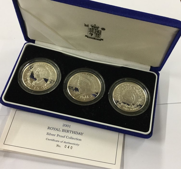 A cased Royal Mint proof set of three Queen Elizab