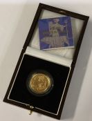 A Royal Mint 1/4 ounce 2001 gold coin. Est. £250 -