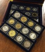 A cased set of 36 silver and silver gilt proof med