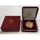 A Queen Elizabeth II Guernsey proof £5 gold coin.