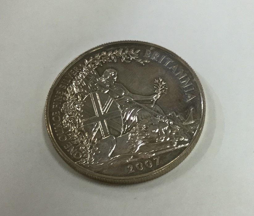 A 1 ounce silver £2 coin. Est. £15 - £20.