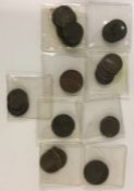 A quantity of brass tokens and pennies. Est. £15 -