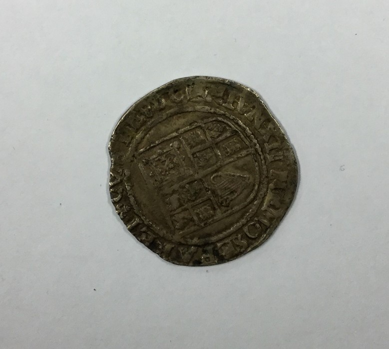A James I silver Shilling. Est. £80 - £120.