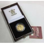 A Royal Mint Britannia £25 1/4 ounce gold coin. Es