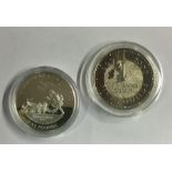 Two proof £5 coins. Est. £10 - £20.