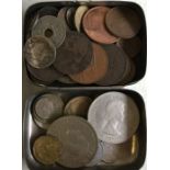 Two tins of commemorative and other coins. Est. £1