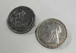 Two silver Crowns mounted as brooches. Approx. 55