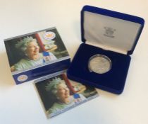 A 2002 proof Golden Jubilee silver £5 coin. Est. £
