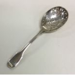 A Continental silver tea strainer with pierced bow