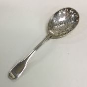 A Continental silver tea strainer with pierced bow