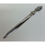 An unusual silver letter opener decorated with a k