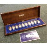 A cased set of eight silver medallions depicting '