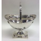 A good George III swing handled silver basket with