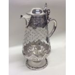 A fine quality Victorian silver claret jug with et