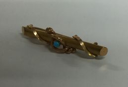 A 15 carat turquoise mounted brooch. Approx. 4.6 g